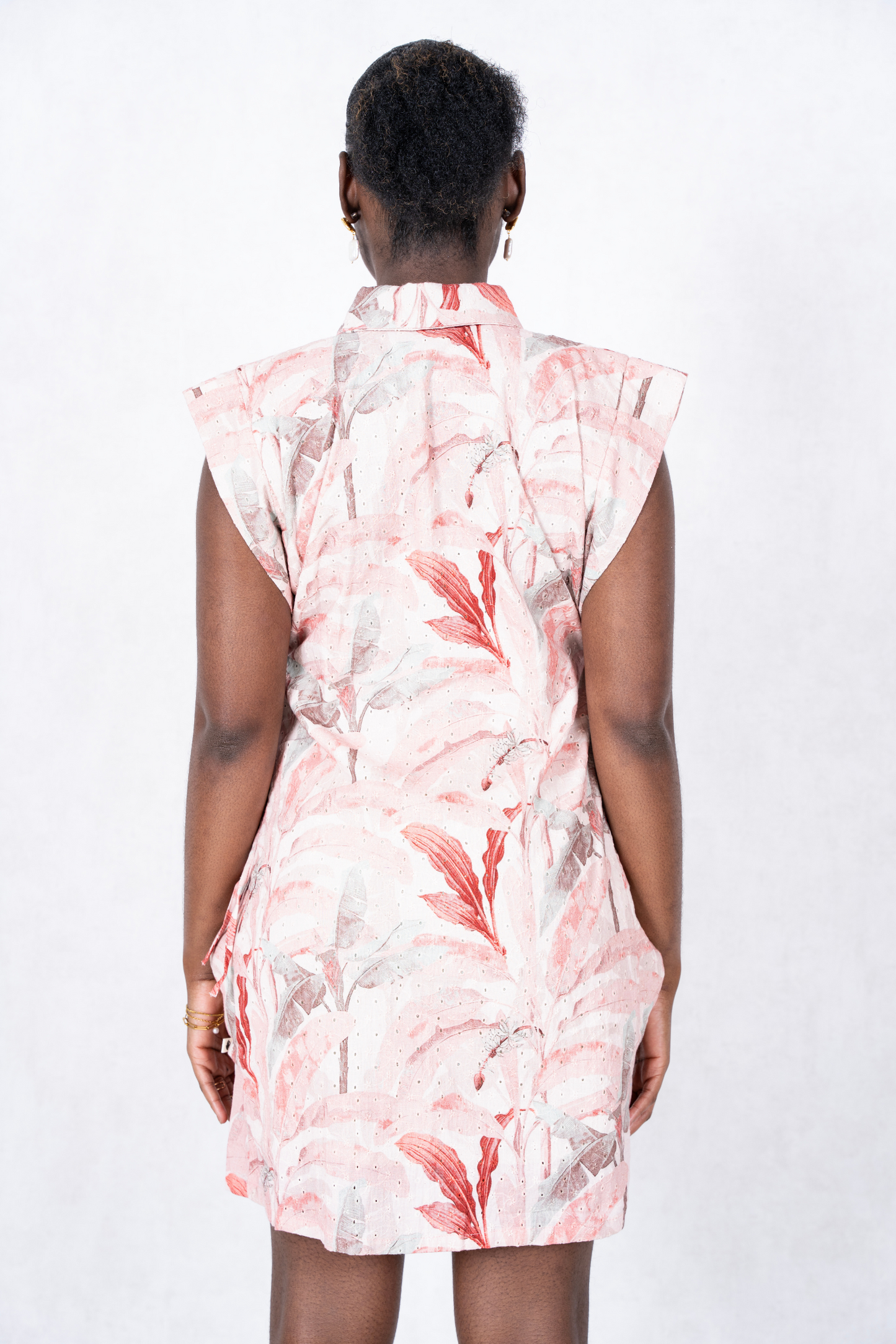 Bay Mini Dress by SAARTHI – A chic, pastel-hued mini dress featuring a playful, floral pattern with puffed sleeves and a flared hemline. Made from lightweight, breathable fabric, it offers a comfortable yet stylish look for summer outings