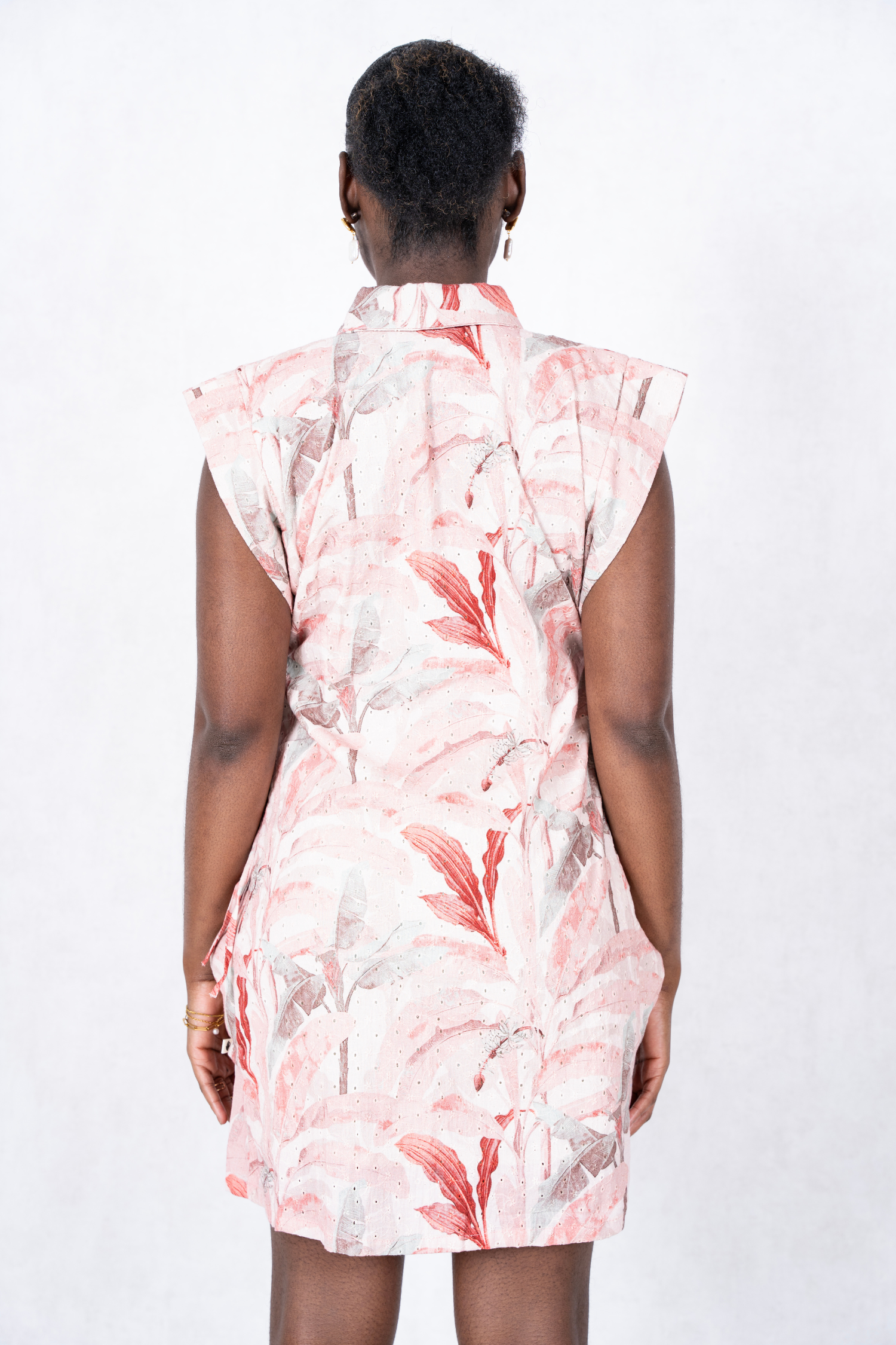 Bay Mini Dress by SAARTHI – A chic, pastel-hued mini dress featuring a playful, floral pattern with puffed sleeves and a flared hemline. Made from lightweight, breathable fabric, it offers a comfortable yet stylish look for summer outings